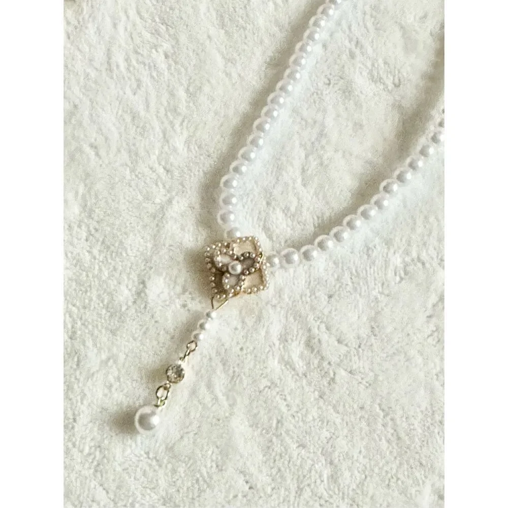 Faux pearl and cream rose statement necklace